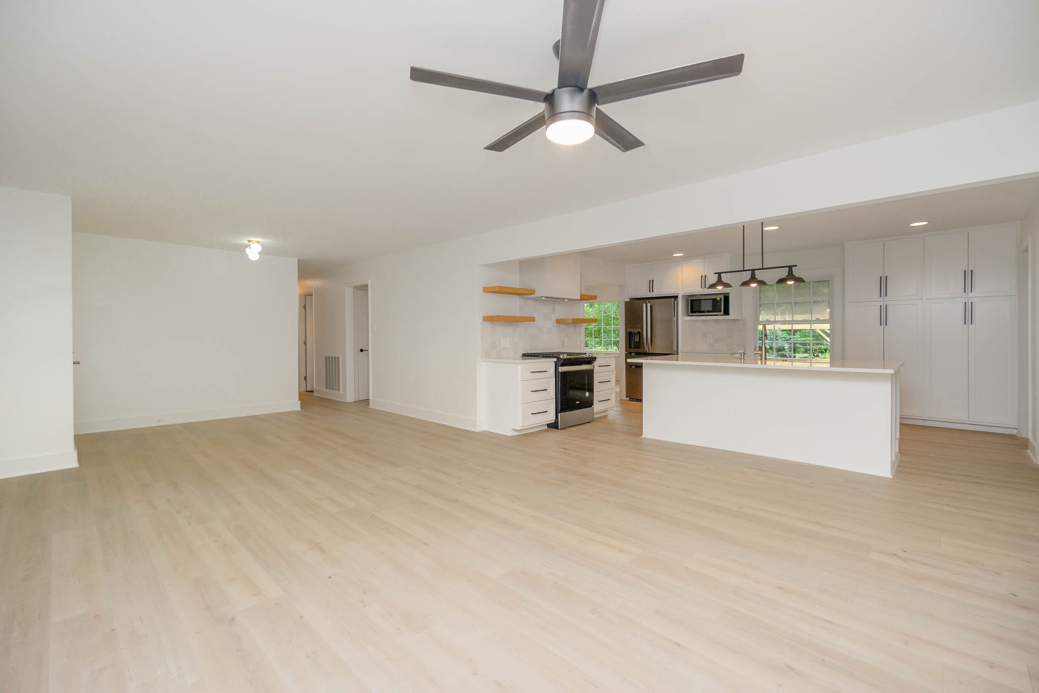 1401 Manor Road Columbia, TN 38401 - Photo 7 of 35 a view of a kitchen with a sink and a refrigerator