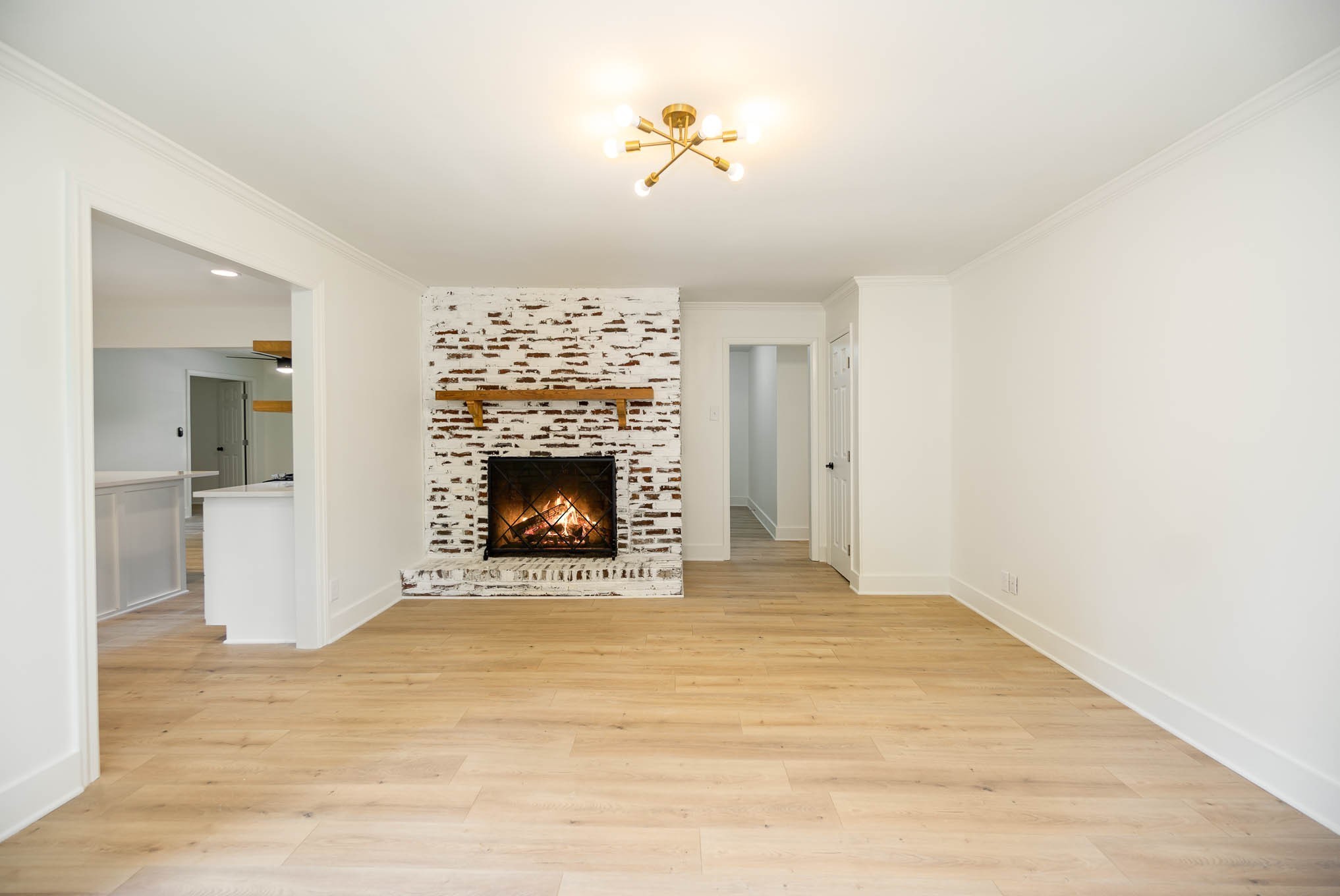 1401 Manor Road Columbia, TN 38401 - Photo 10 of 35 a view of an empty room with a fireplace