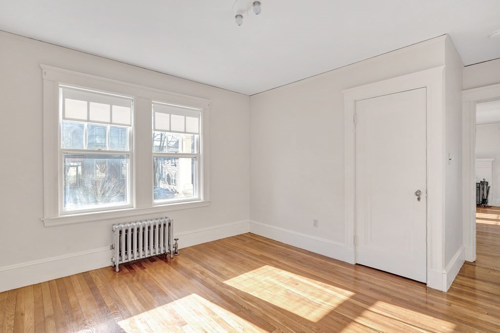 18-20 Walcott Road Watertown, MA 02472 - Photo 21 of 40 a view of an empty room with a window