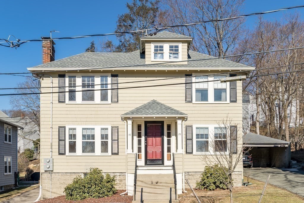 18-20 Walcott Road Watertown, MA 02472 - Photo 3 of 40 a front view of a house with a yard