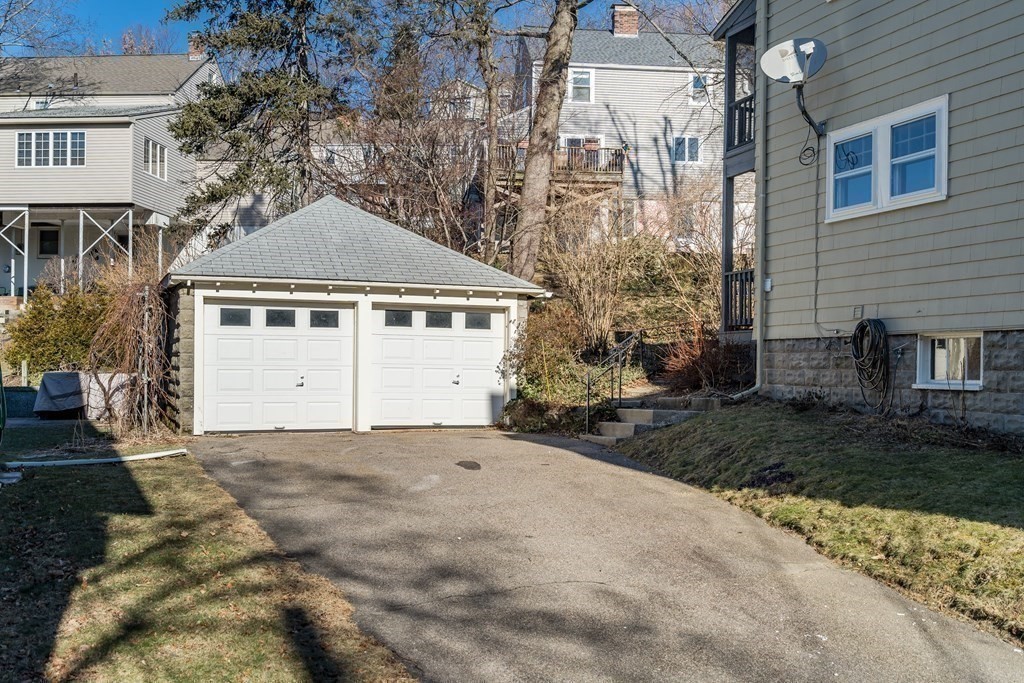 18-20 Walcott Road Watertown, MA 02472 - Photo 37 of 40 a view of a house with a yard