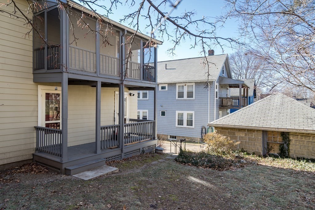 18-20 Walcott Road Watertown, MA 02472 - Photo 38 of 40 a view of a house with a yard