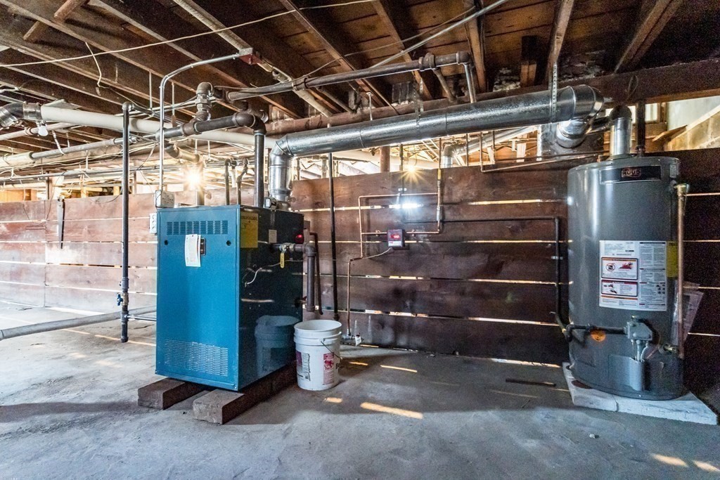 18-20 Walcott Road Watertown, MA 02472 - Photo 39 of 40 a view of store room with water heater