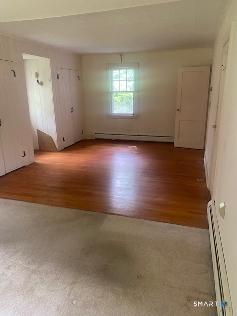 33 Flanders Road Bethlehem, CT 06751 - Photo 14 of 18 an empty room with wooden floor and windows