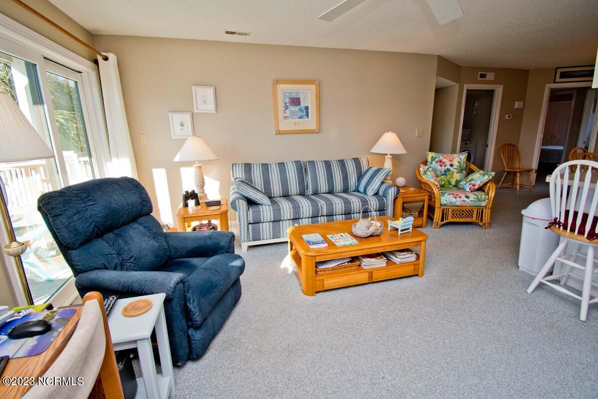 9201 Coast Guard Road, Unit B203 Emerald Isle, NC 28594 - Photo 16 of 37 living room