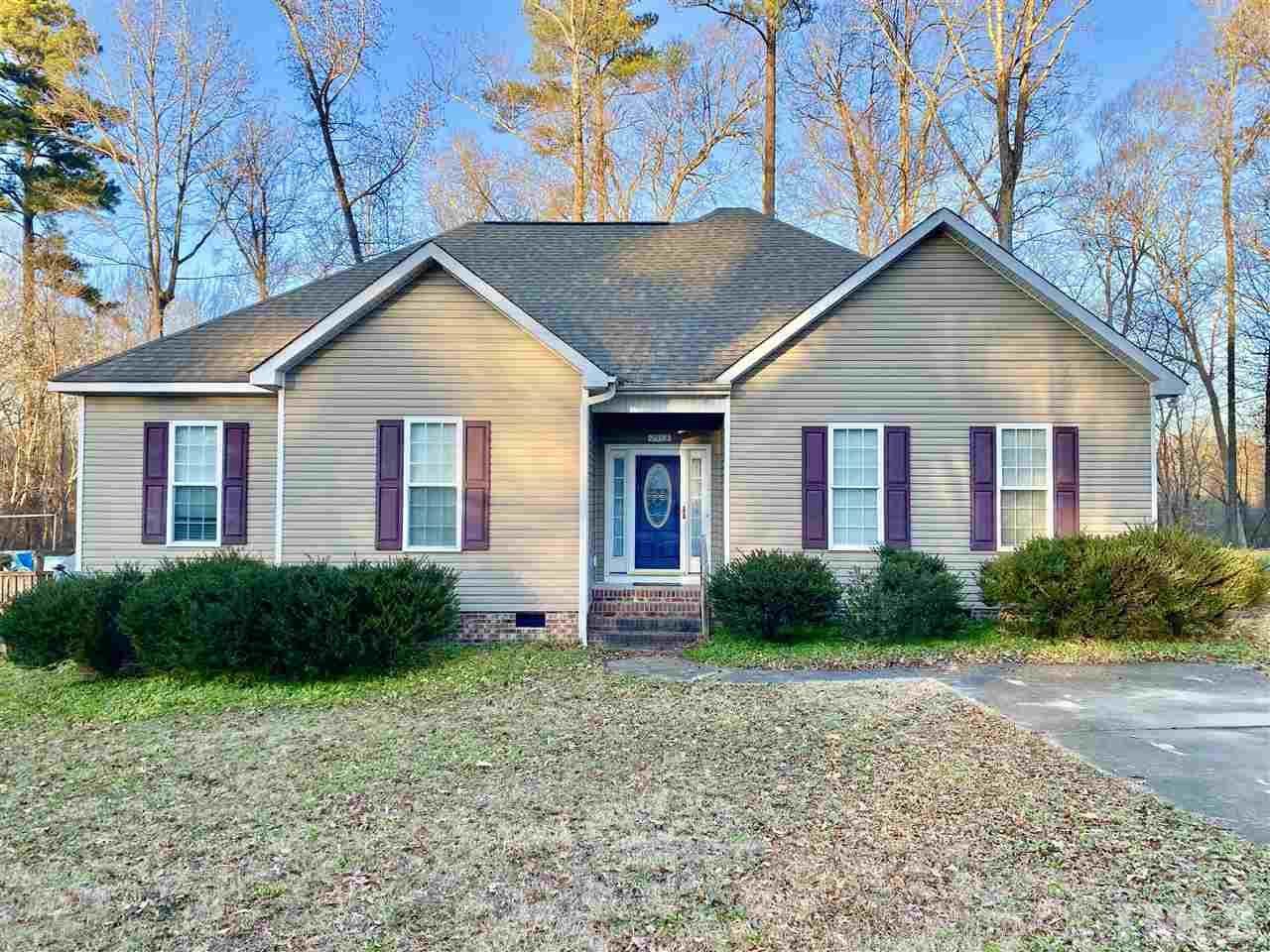 2513 Friendly Trail Raleigh, NC 27610 - Photo 1 of 29 a view of a house with yard and plants