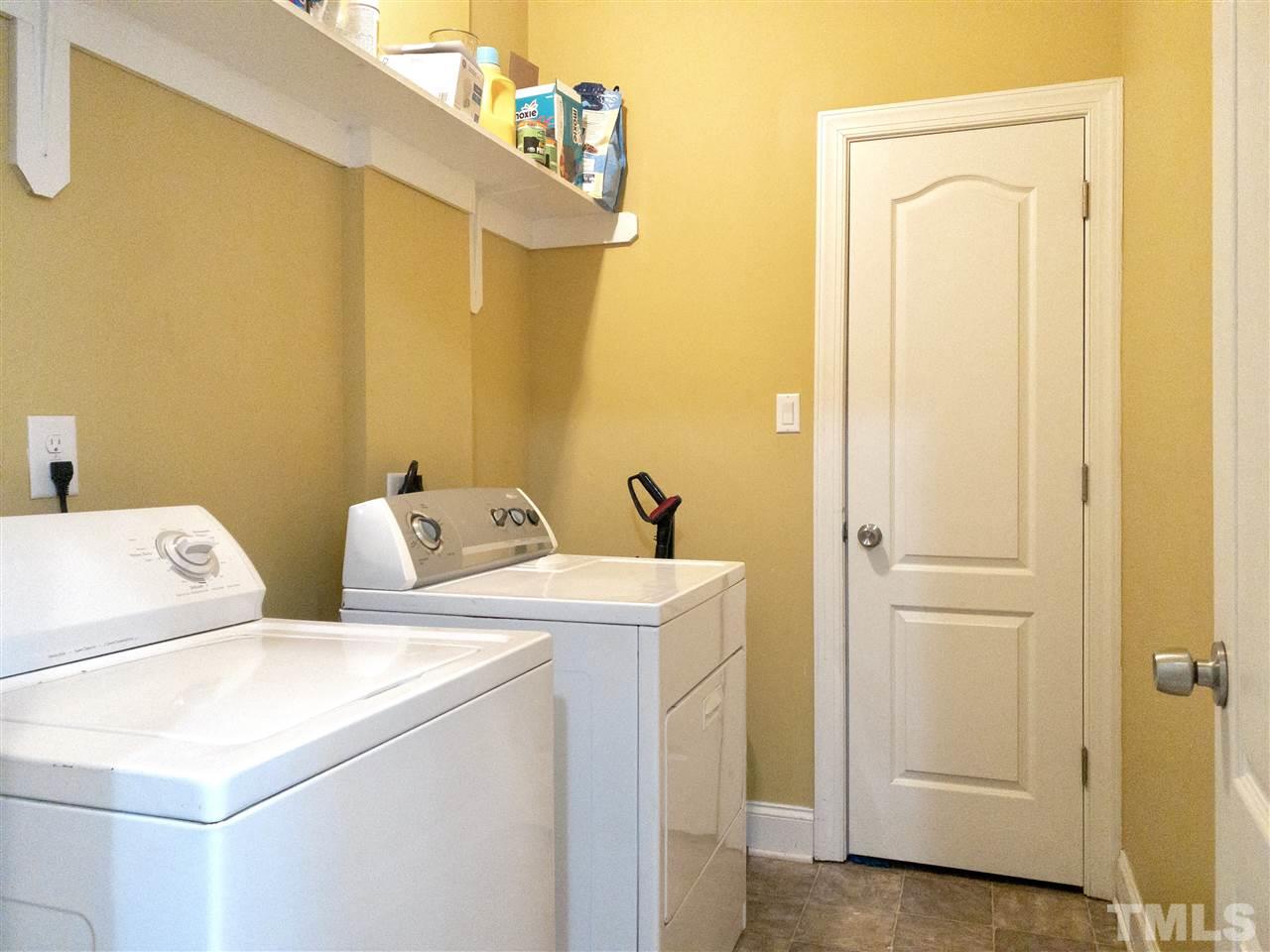 2513 Friendly Trail Raleigh, NC 27610 - Photo 13 of 29 a utility room with dryer and washer