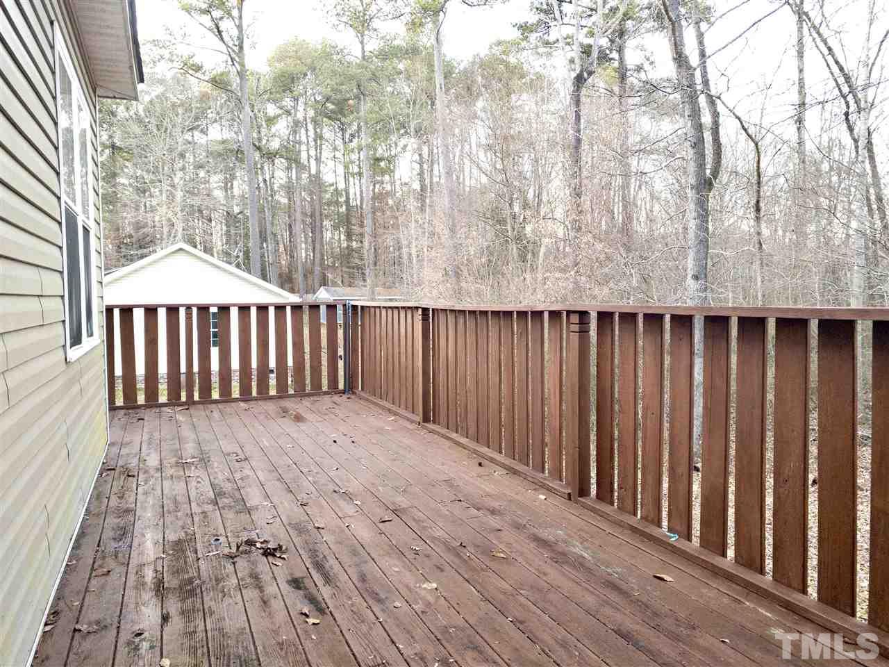 2513 Friendly Trail Raleigh, NC 27610 - Photo 27 of 29 a view of wooden deck