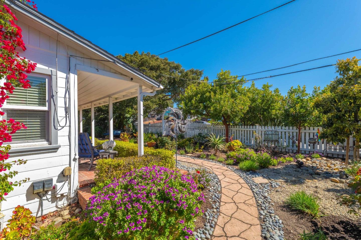 1 Serrano Way Del Rey Oaks, CA 93940 - Photo 43 of 47 a garden with flowers in front of it
