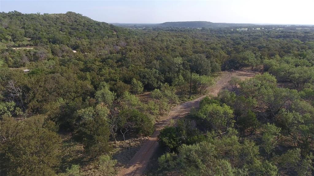 20 Ih Santo, TX 76472 - Photo 30 of 38 Aerial overview of property's location with a heavily wooded area