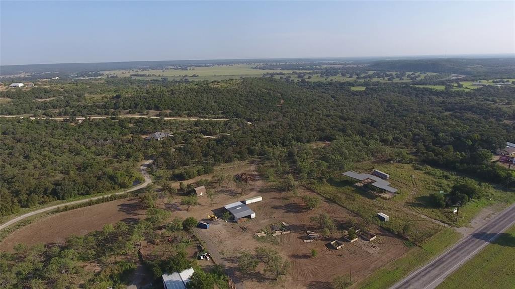 20 Ih Santo, TX 76472 - Photo 7 of 38 Aerial overview of property's location with a forest