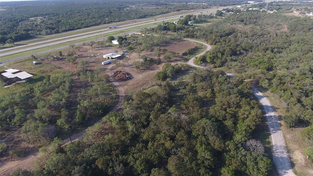 20 Ih Santo, TX 76472 - Photo 8 of 38 Aerial view of property's location featuring a forest