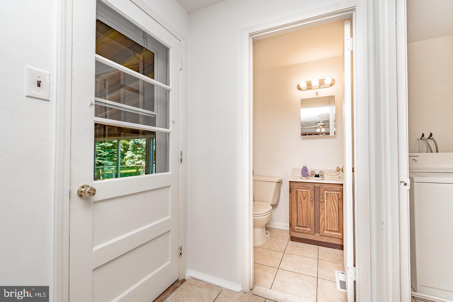 1901 Byberry Road Bensalem, PA 19020 - Photo 34 of 56 Powder Room and Rear Door to Sunroom