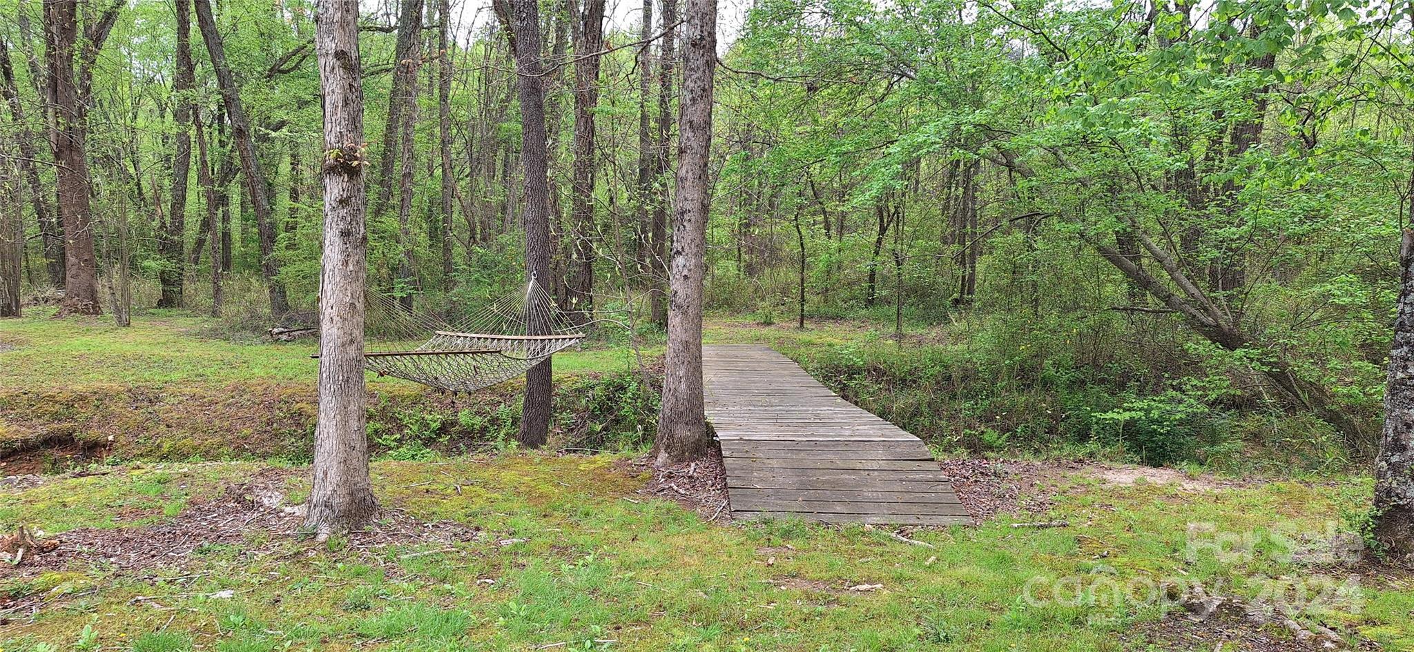 4094 Lefevers Road Vale, NC 28168 - Photo 29 of 47 a view of a backyard with trees