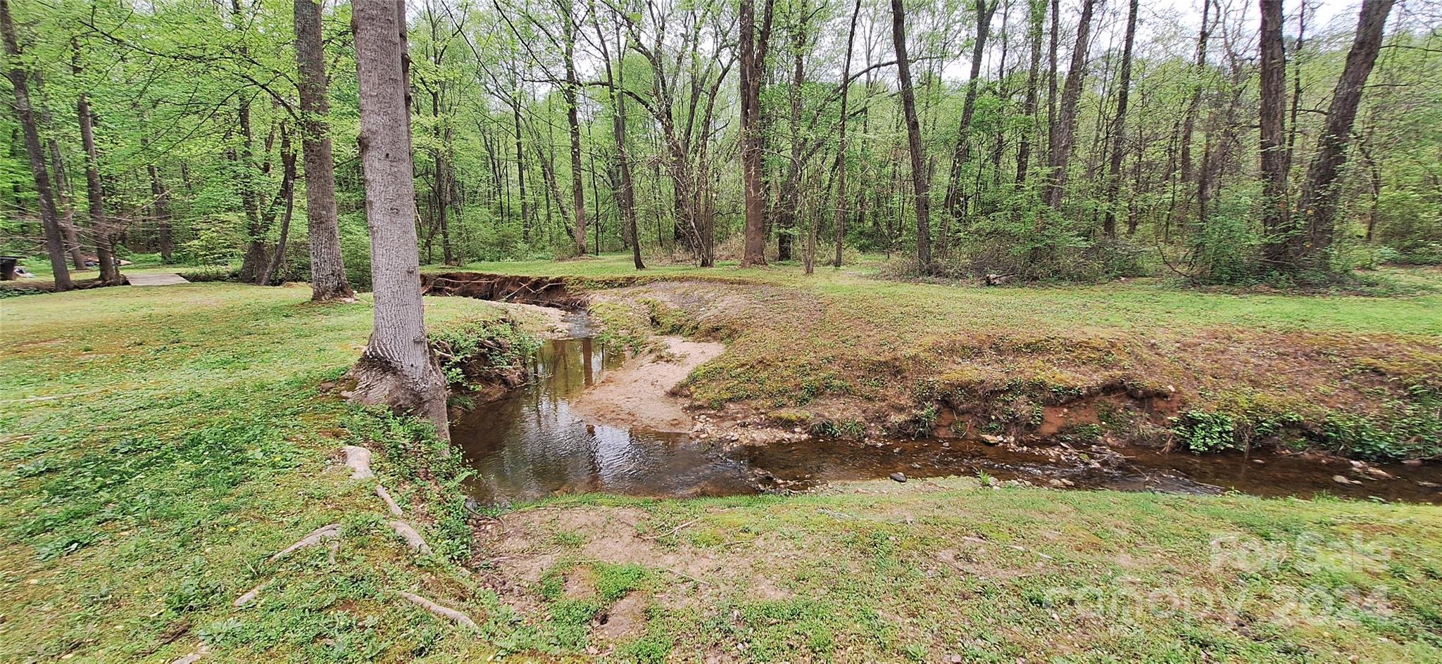 4094 Lefevers Road Vale, NC 28168 - Photo 32 of 47 a view of outdoor space with trees all around