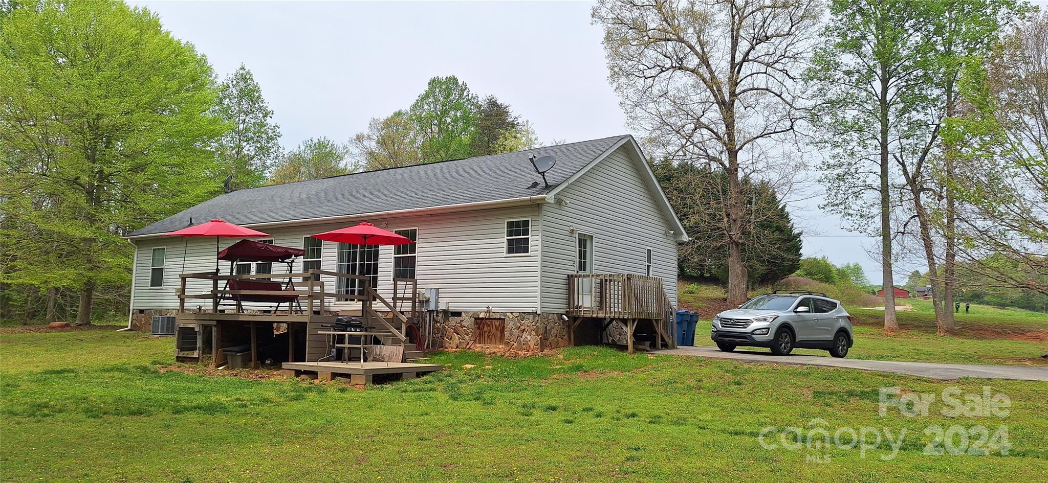 4094 Lefevers Road Vale, NC 28168 - Photo 34 of 47 a front view of a house with garden