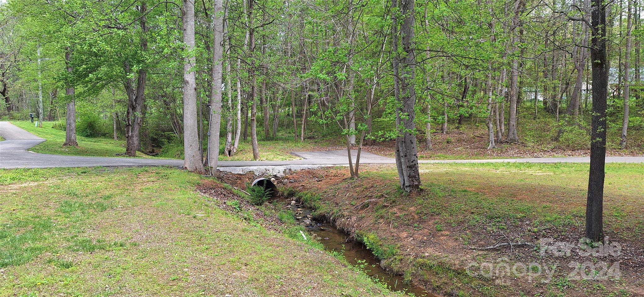 4094 Lefevers Road Vale, NC 28168 - Photo 40 of 47 a backyard of a house with lots of green space