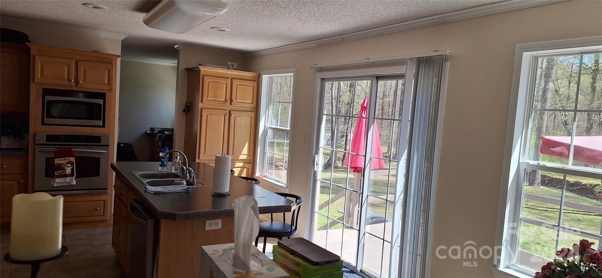 4094 Lefevers Road Vale, NC 28168 - Photo 6 of 47 a view of a workspace with furniture and a window