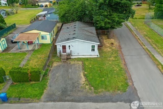 705 1st Avenue Southwest Castle Rock, WA 98611 - Photo 2 of 11 a aerial view of a house with a garden