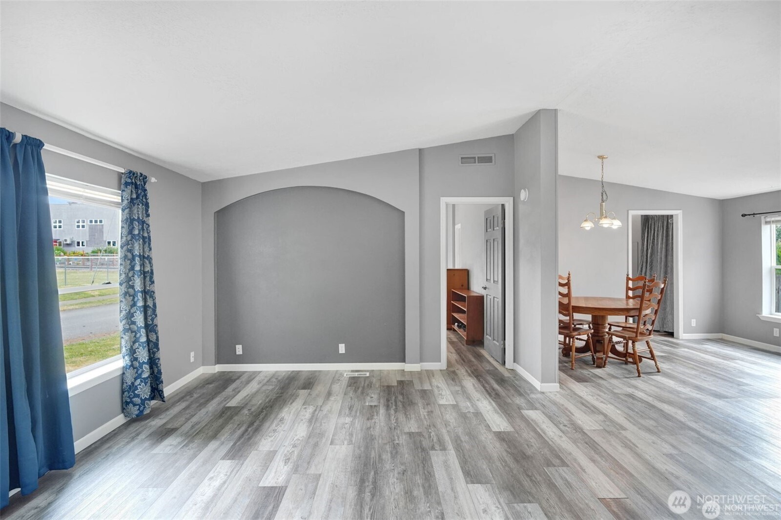 705 1st Avenue Southwest Castle Rock, WA 98611 - Photo 9 of 11 a view of room with furniture and a window