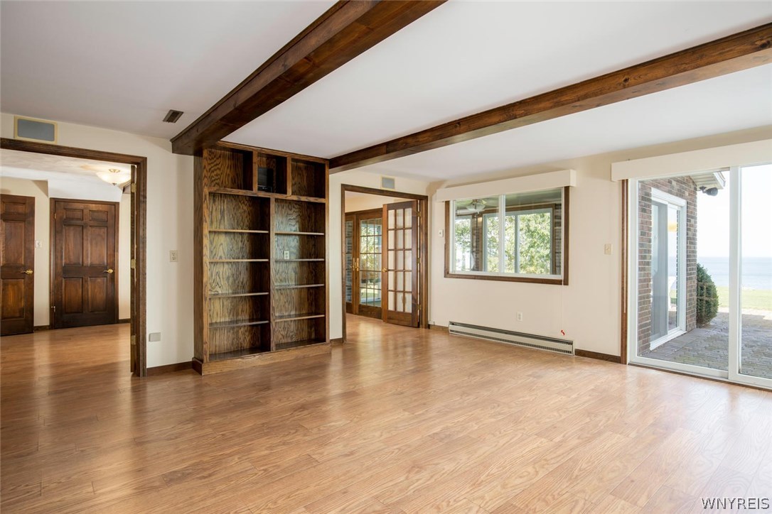 629 Lake Road Porter, NY 14174 - Photo 15 of 35 Another view of family room highlighting ample boo