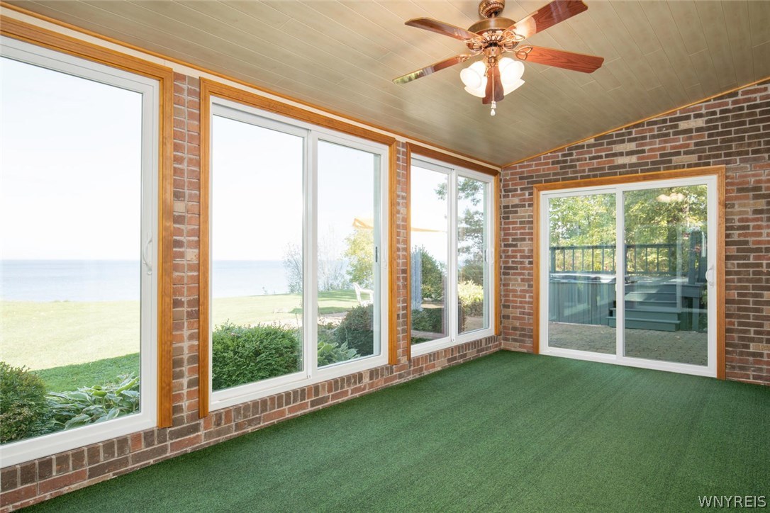 629 Lake Road Porter, NY 14174 - Photo 16 of 35 Sun Room with four season view of Lake Ontario.