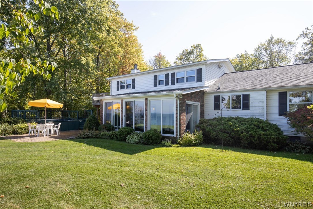 629 Lake Road Porter, NY 14174 - Photo 28 of 35 Back yard of house featuring plenty of grass for k