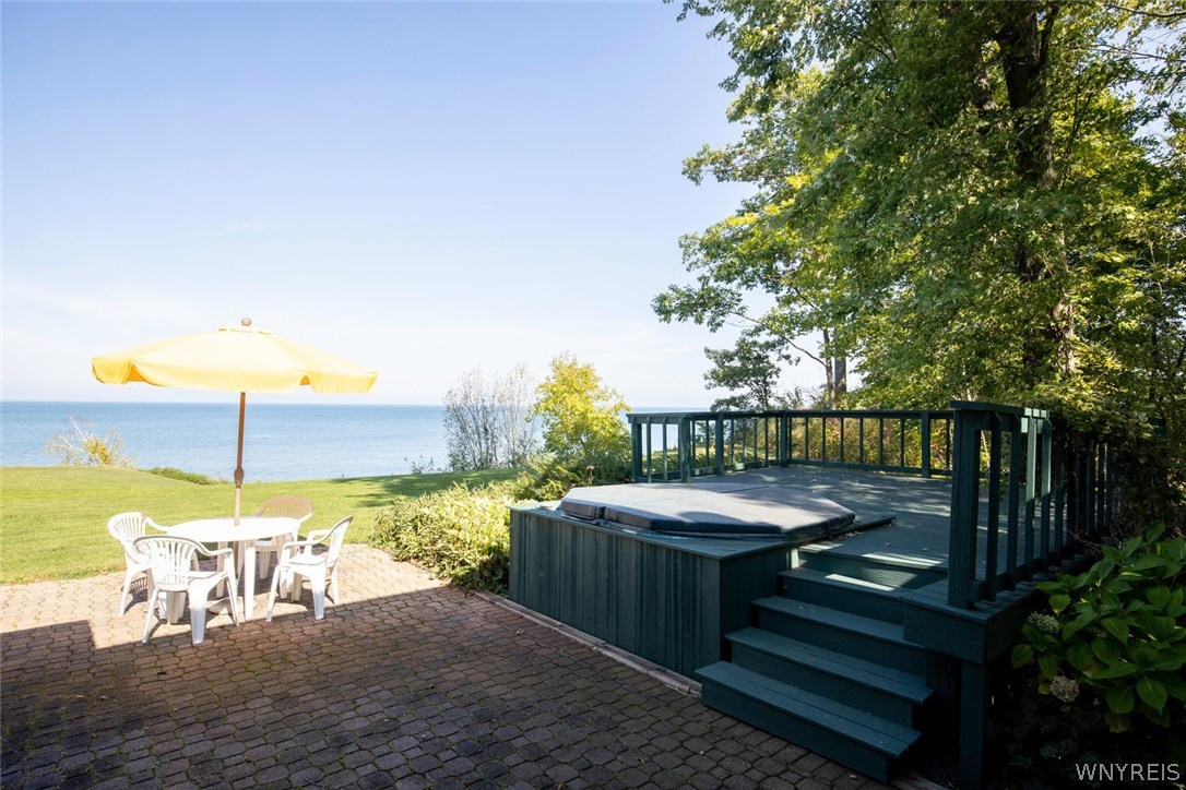 629 Lake Road Porter, NY 14174 - Photo 29 of 35 Brick patio, deck, hot tub (ÄS IS"-needs new