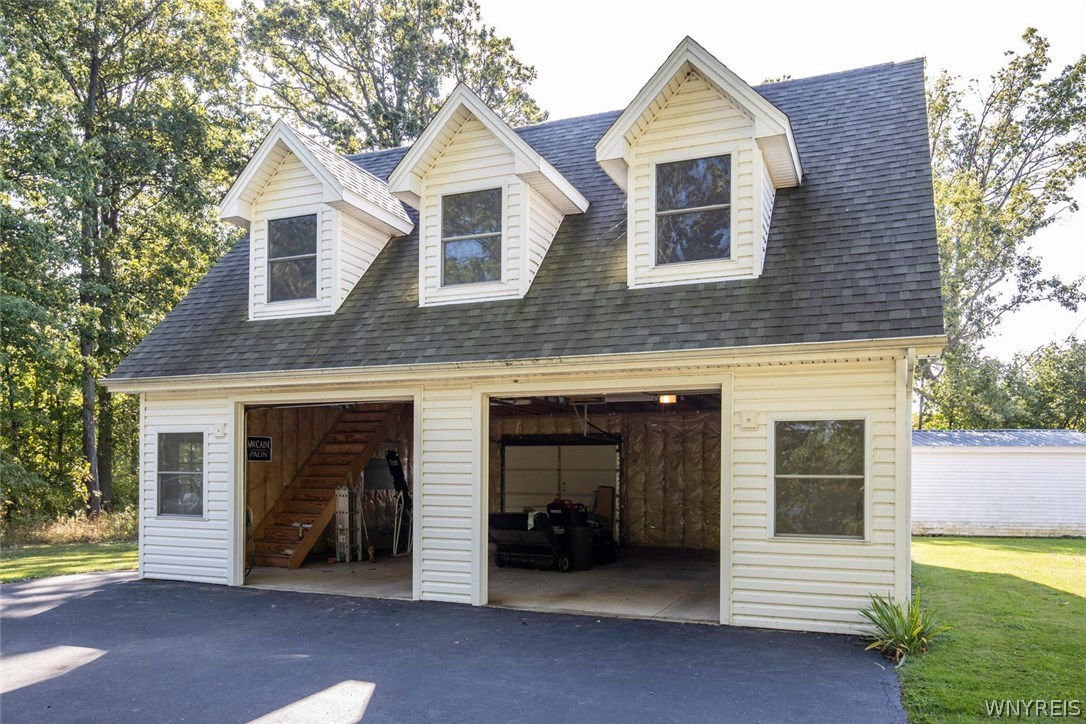 629 Lake Road Porter, NY 14174 - Photo 32 of 35 Garage with doors open showing the amount of stora