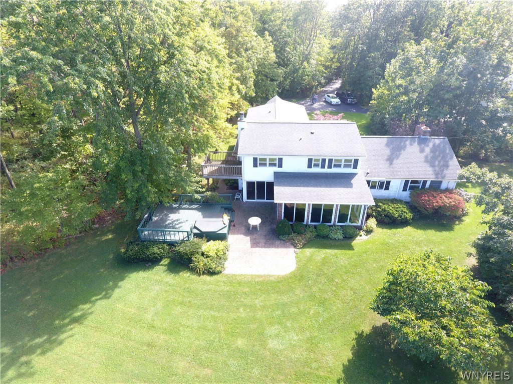 629 Lake Road Porter, NY 14174 - Photo 5 of 35 Aerial view of back of house and attractive lawn,