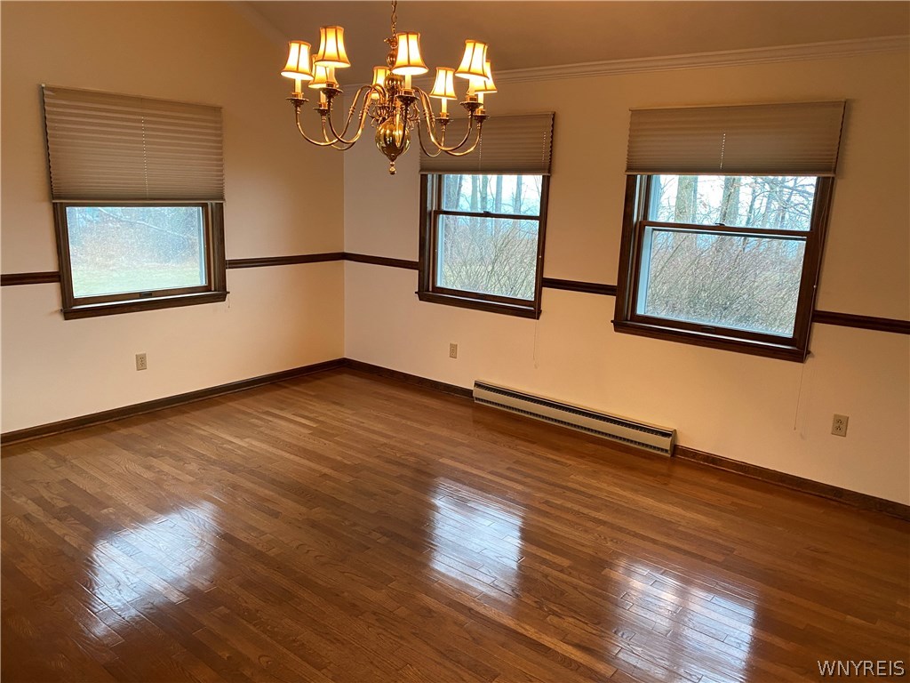 629 Lake Road Porter, NY 14174 - Photo 8 of 35 Dining area with two window view of back yard and