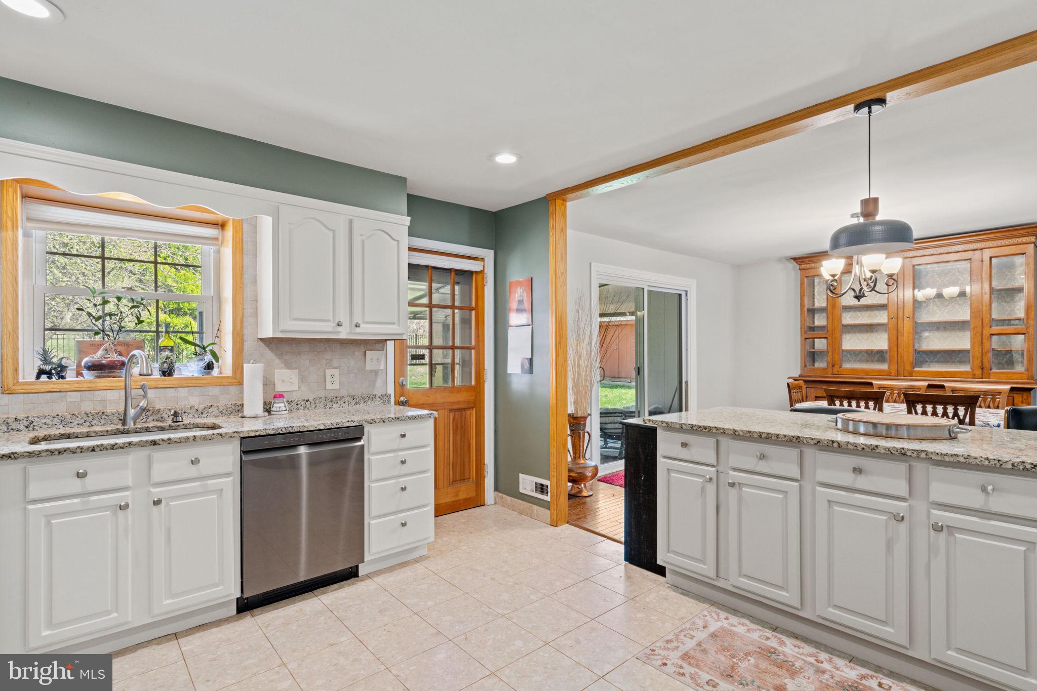 1505 Redwood Lane Wyncote, PA 19095 - Photo 12 of 51 a kitchen with white cabinets and sink