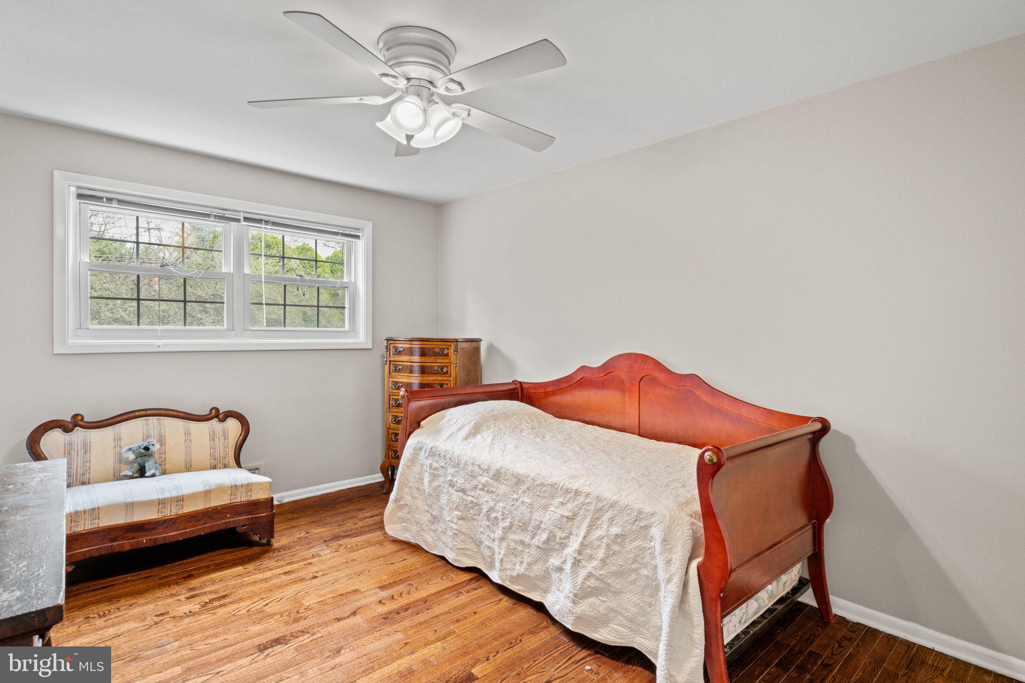 1505 Redwood Lane Wyncote, PA 19095 - Photo 22 of 51 a bedroom with a bed and window