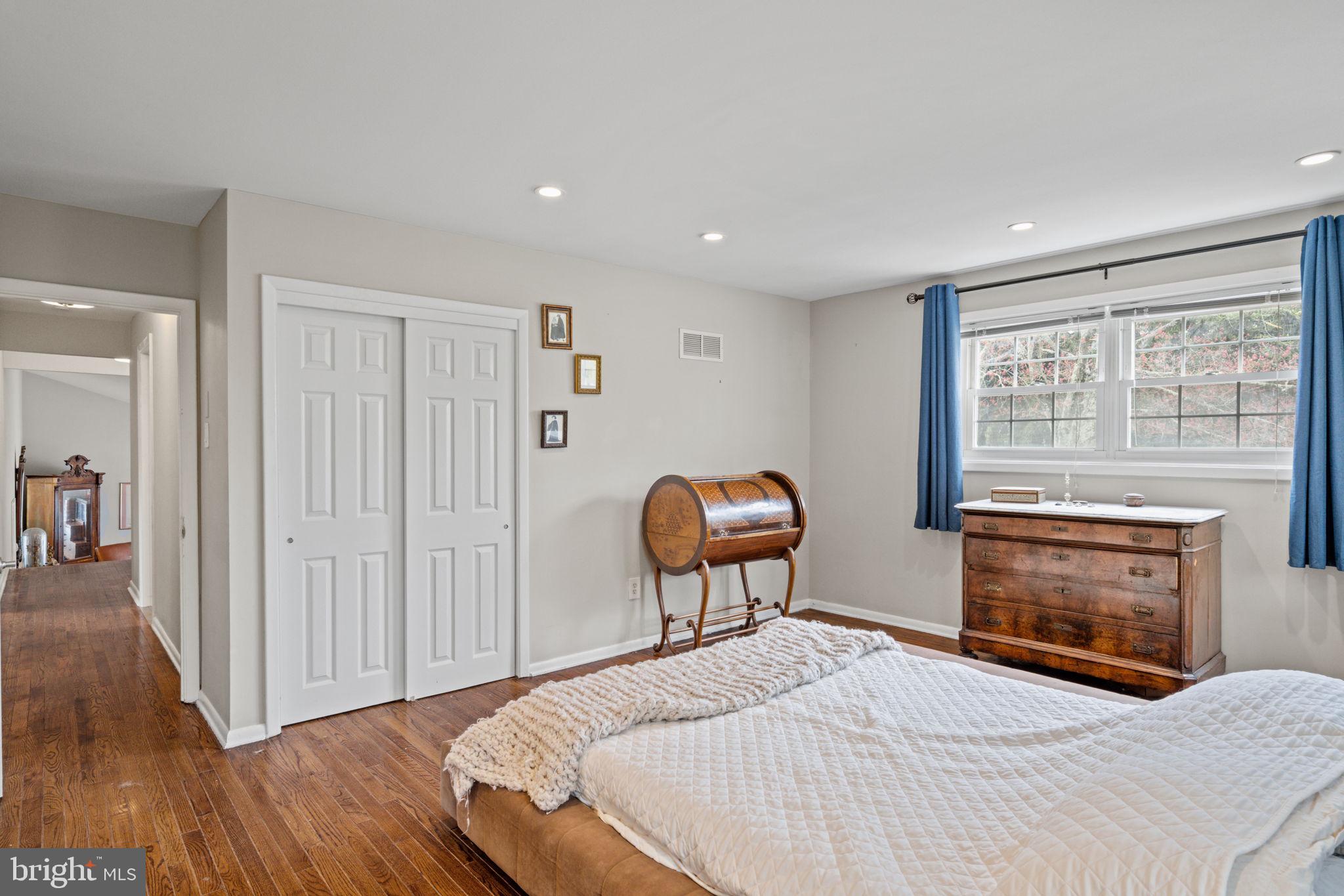 1505 Redwood Lane Wyncote, PA 19095 - Photo 27 of 51 a bedroom with a bed and a chair