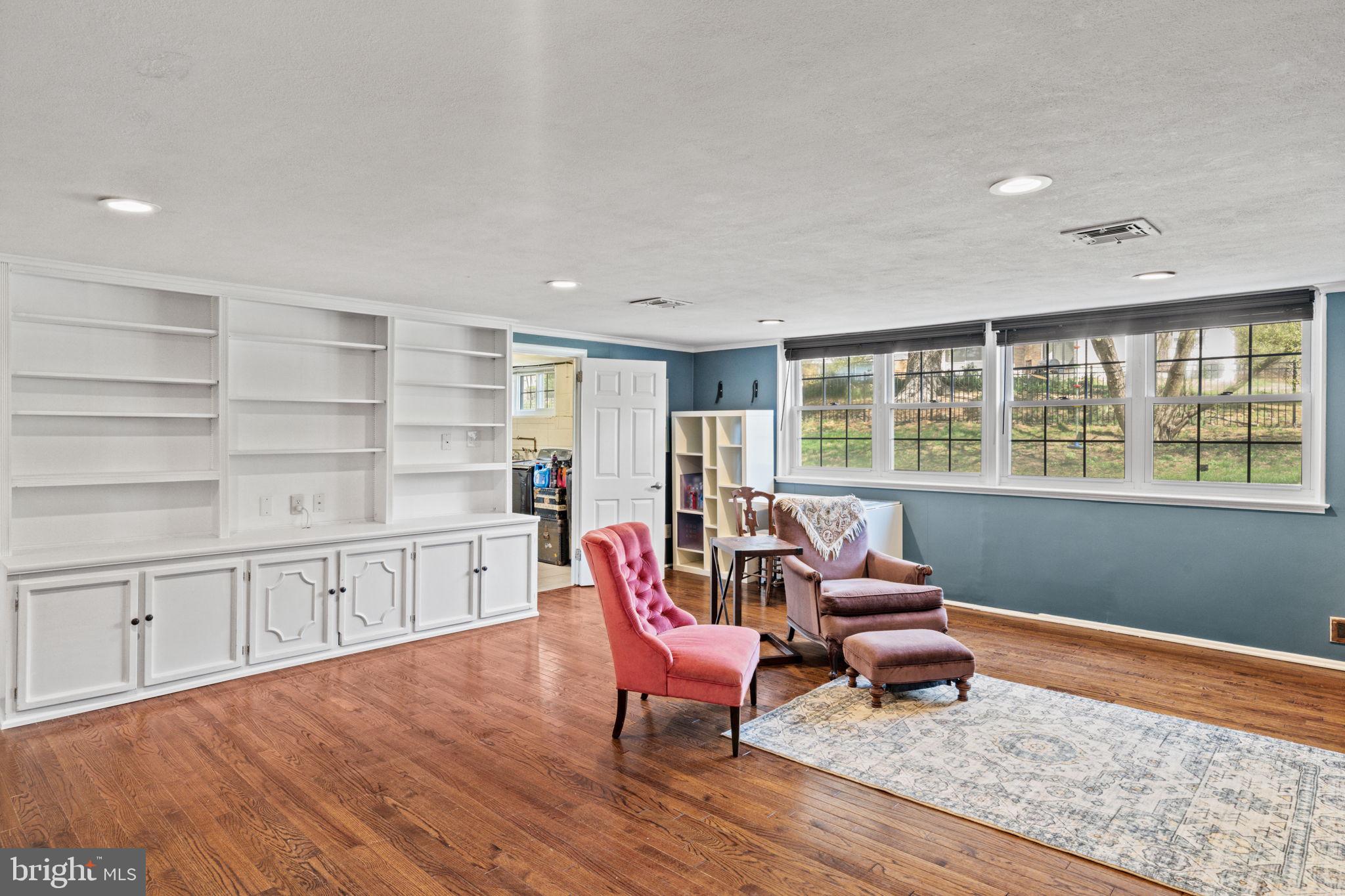 1505 Redwood Lane Wyncote, PA 19095 - Photo 36 of 51 a living room with furniture and a wooden floor