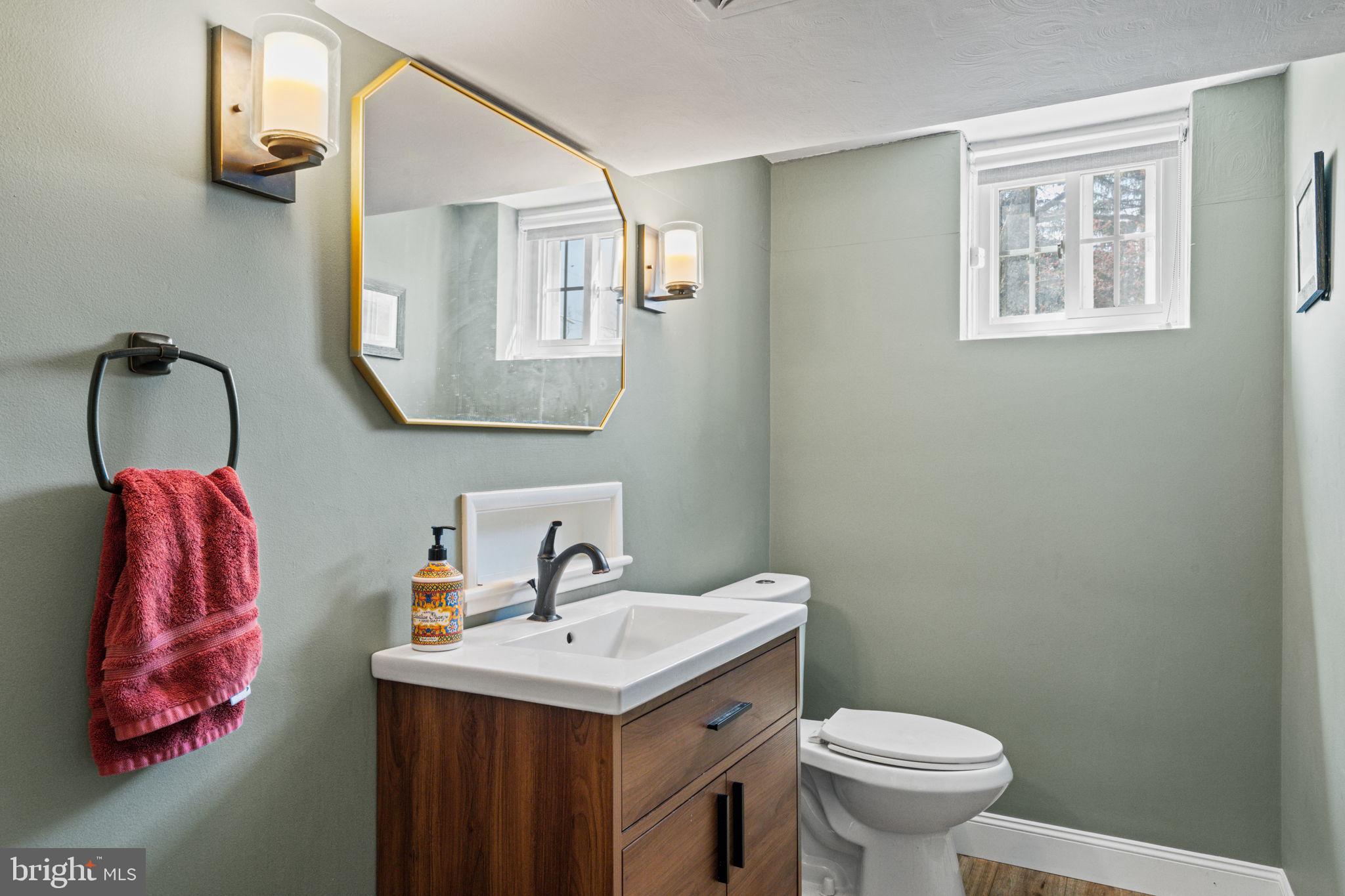1505 Redwood Lane Wyncote, PA 19095 - Photo 37 of 51 a bathroom with a sink mirror and toilet