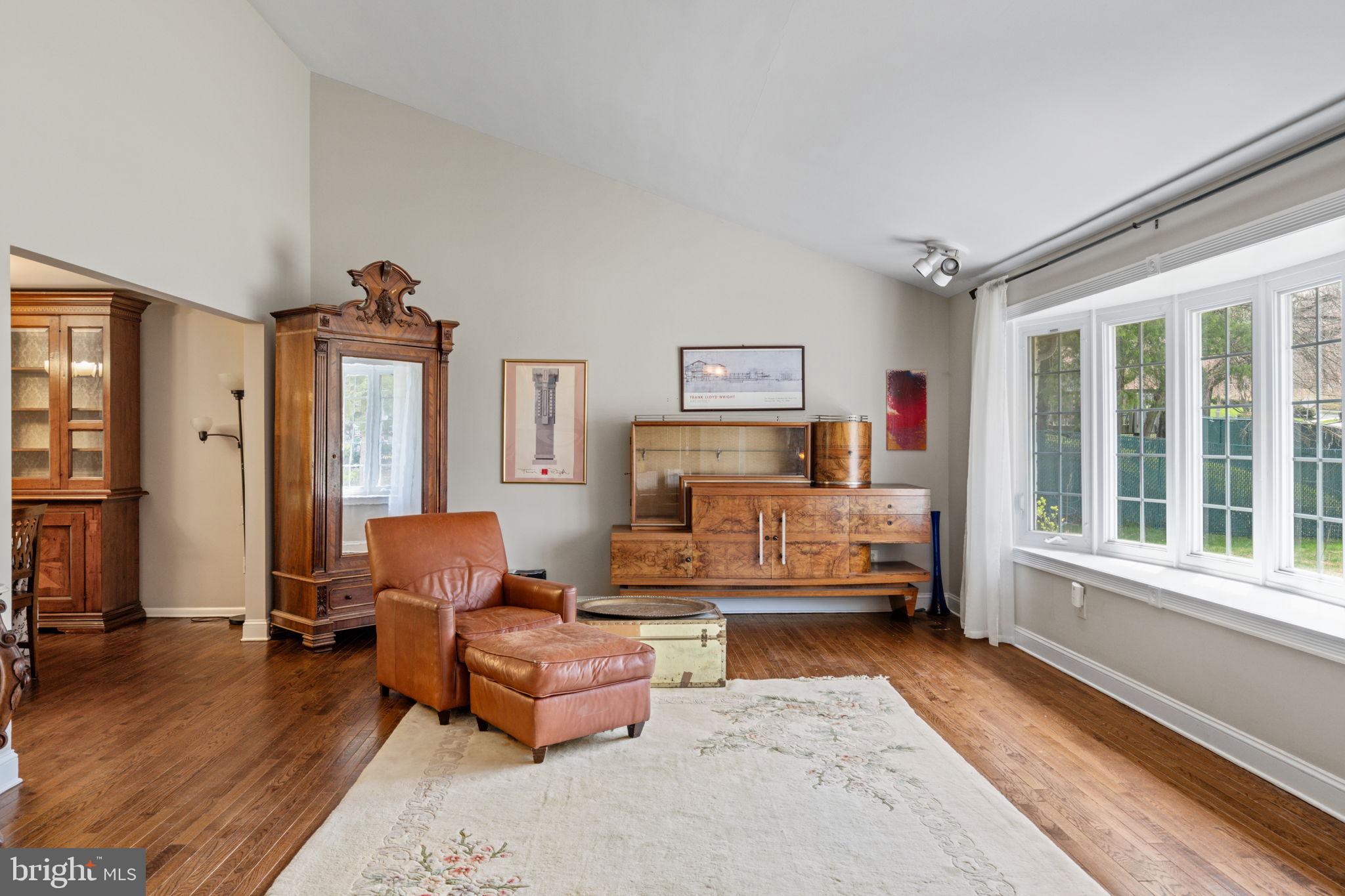 1505 Redwood Lane Wyncote, PA 19095 - Photo 4 of 51 a living room with furniture and a large window
