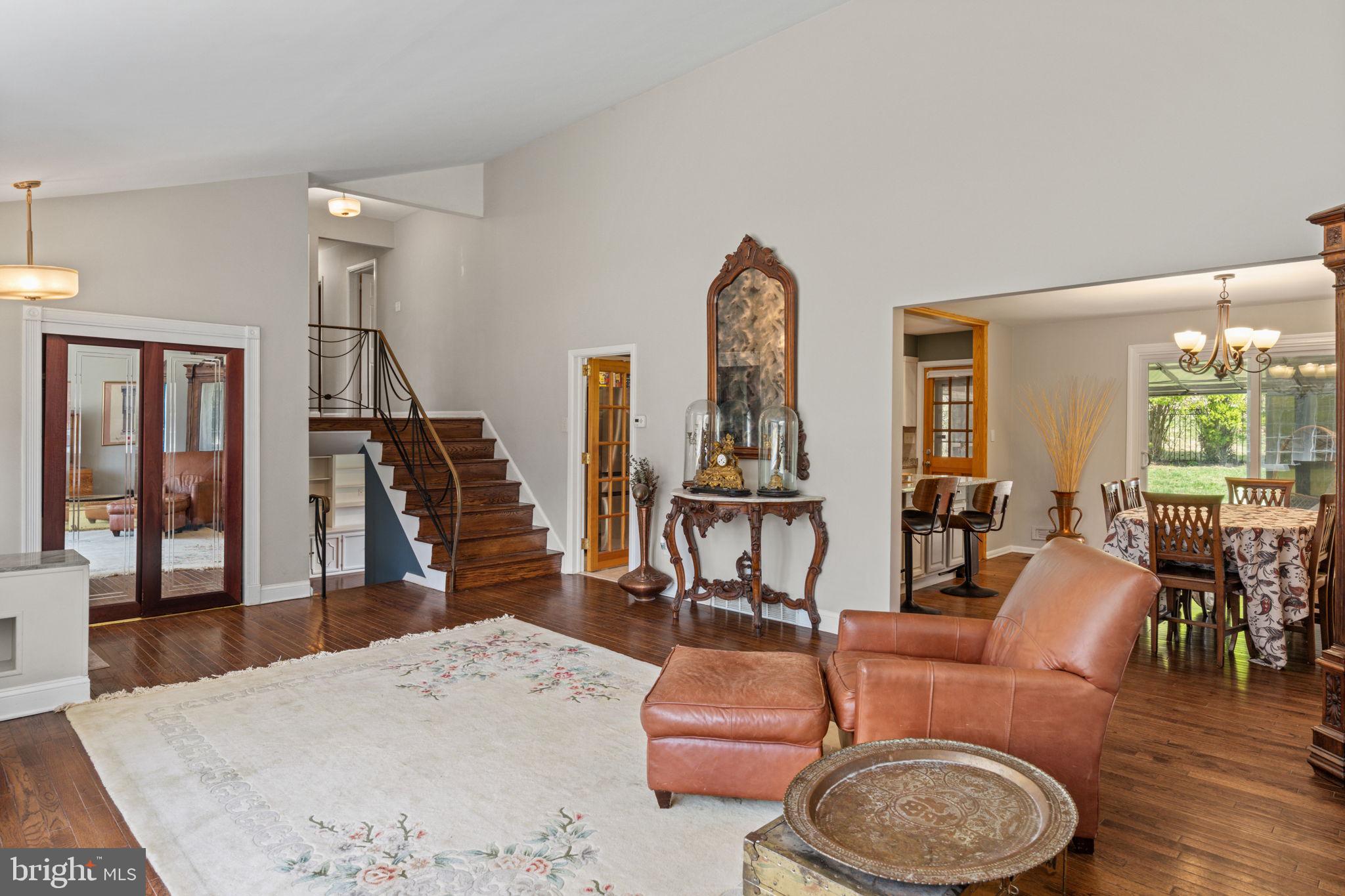 1505 Redwood Lane Wyncote, PA 19095 - Photo 6 of 51 a living room with furniture a rug and wooden floor