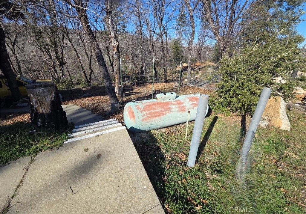 374 Jatko Road Berry Creek, CA 95916 - Photo 27 of 27 a view of a backyard with wooden fence