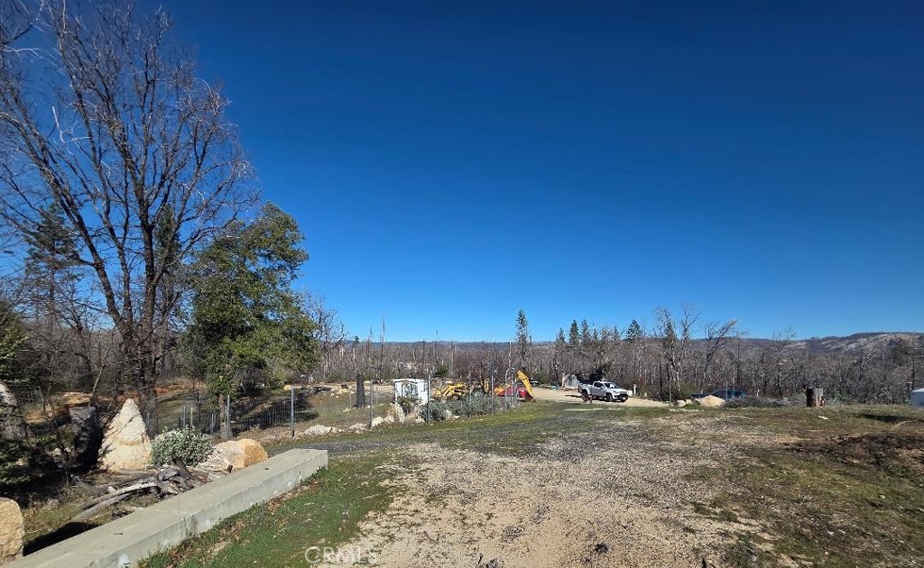 374 Jatko Road Berry Creek, CA 95916 - Photo 10 of 27 a view of a dry yard with trees
