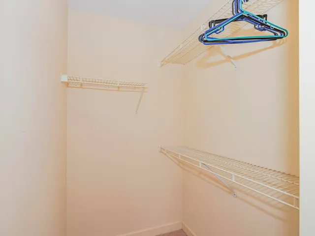 a view of a room with racks on the wall