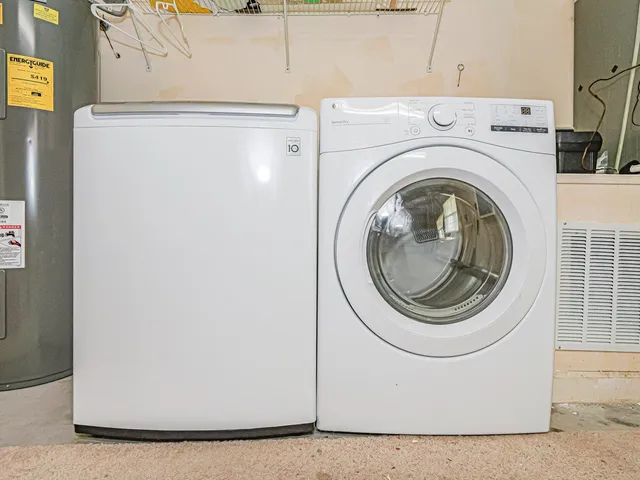 a utility room with dryer and washer