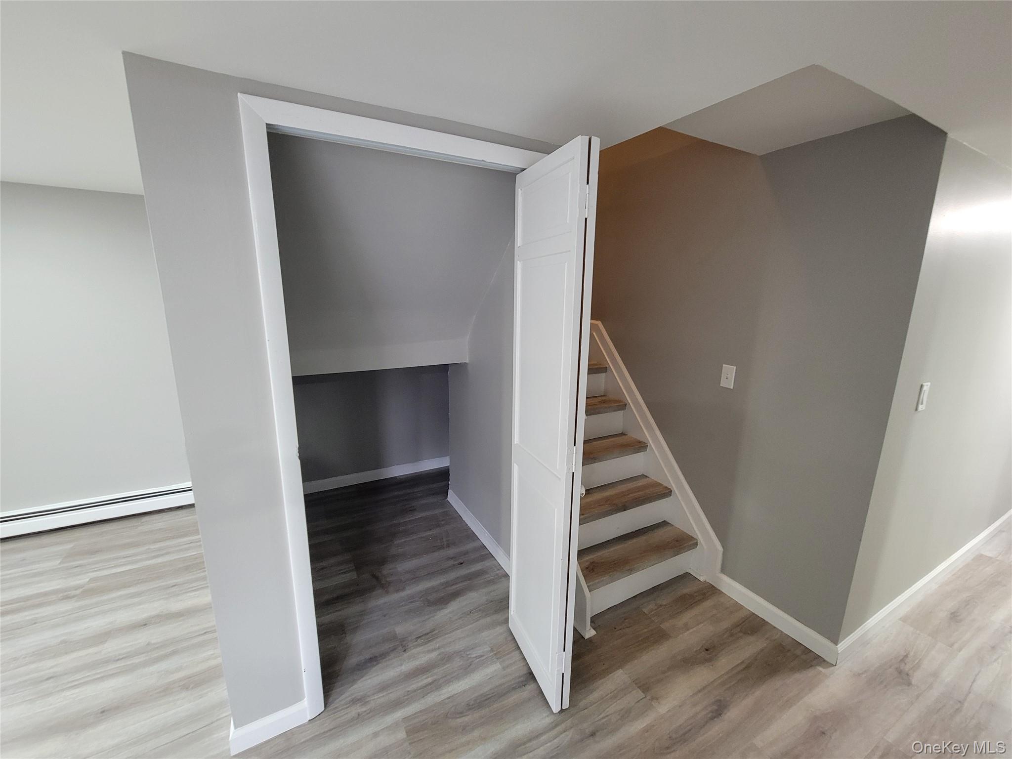 96 Hallock Landing Road Rocky Point, NY 11778 - Photo 13 of 13 a view of entryway with wooden floor