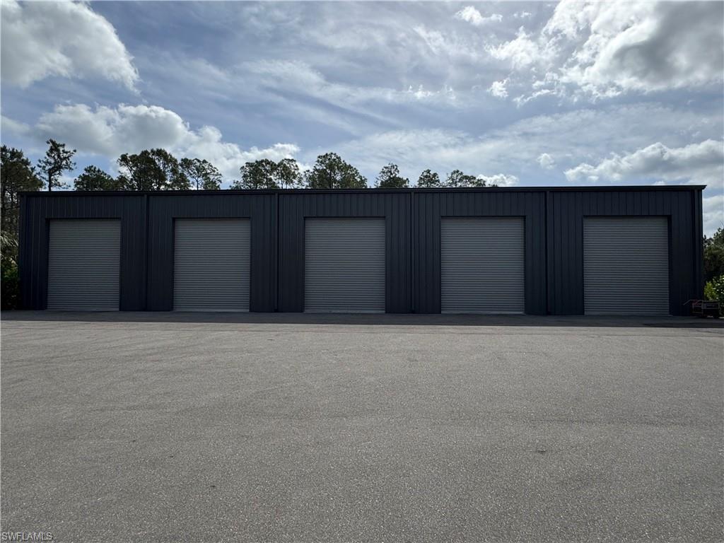 582 17th Street Southwest Naples, FL 34117 - Photo 1 of 1 View of garage front