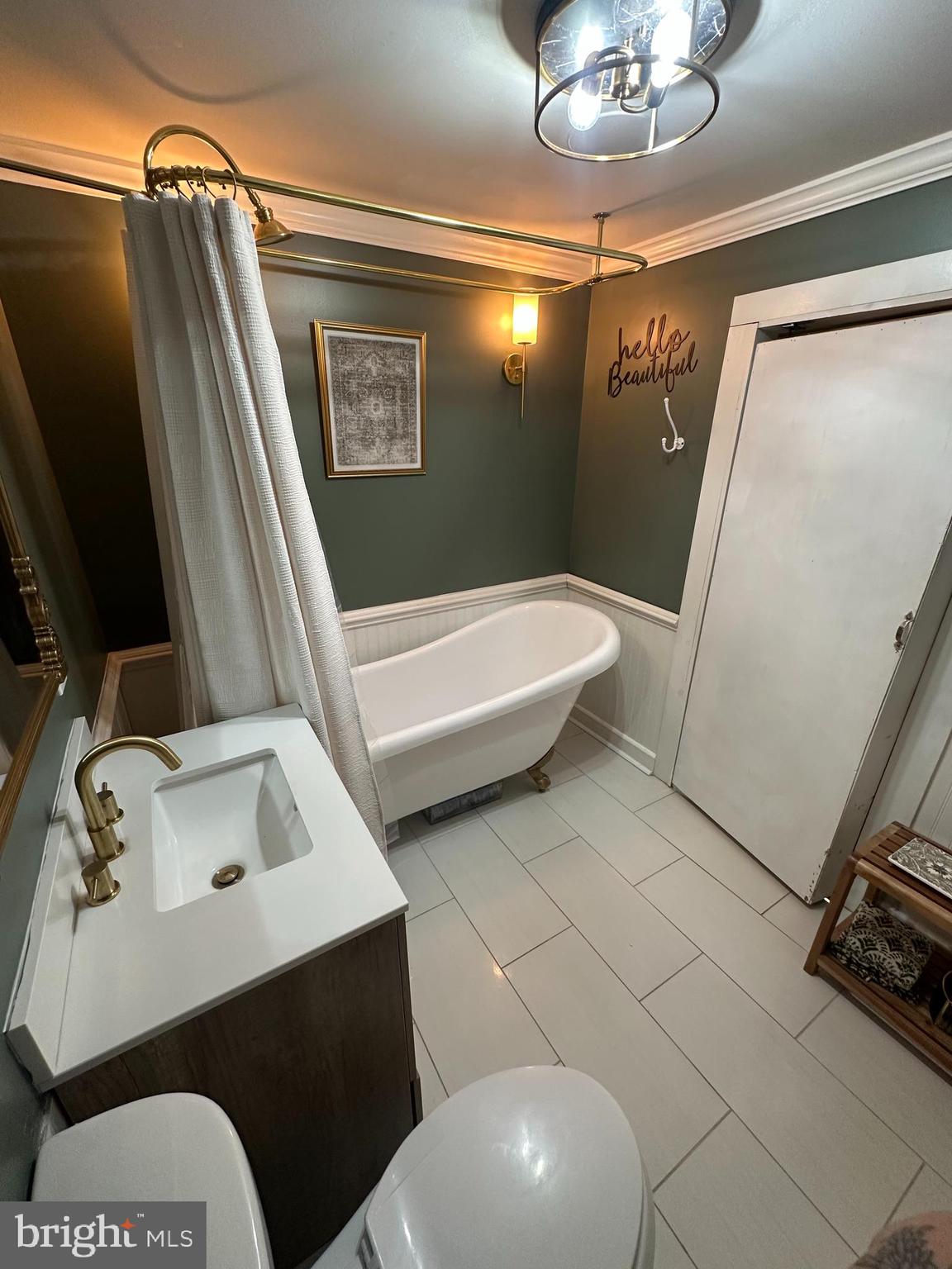 723 Newportville Road Croydon, PA 19021 - Photo 12 of 23 a bathroom with a sink a toilet a mirror and shower