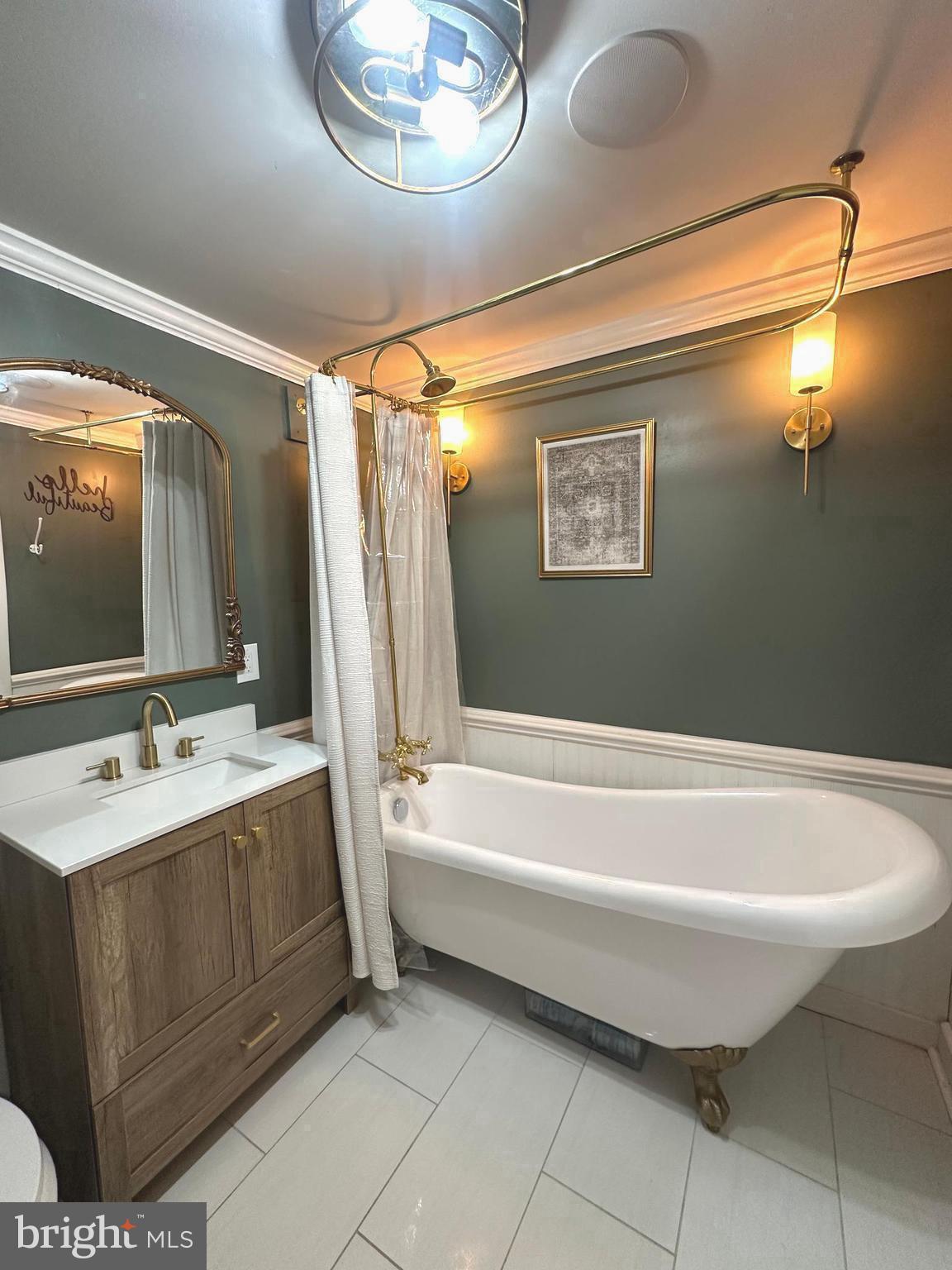 723 Newportville Road Croydon, PA 19021 - Photo 13 of 23 a bathroom with a bathtub and a sink
