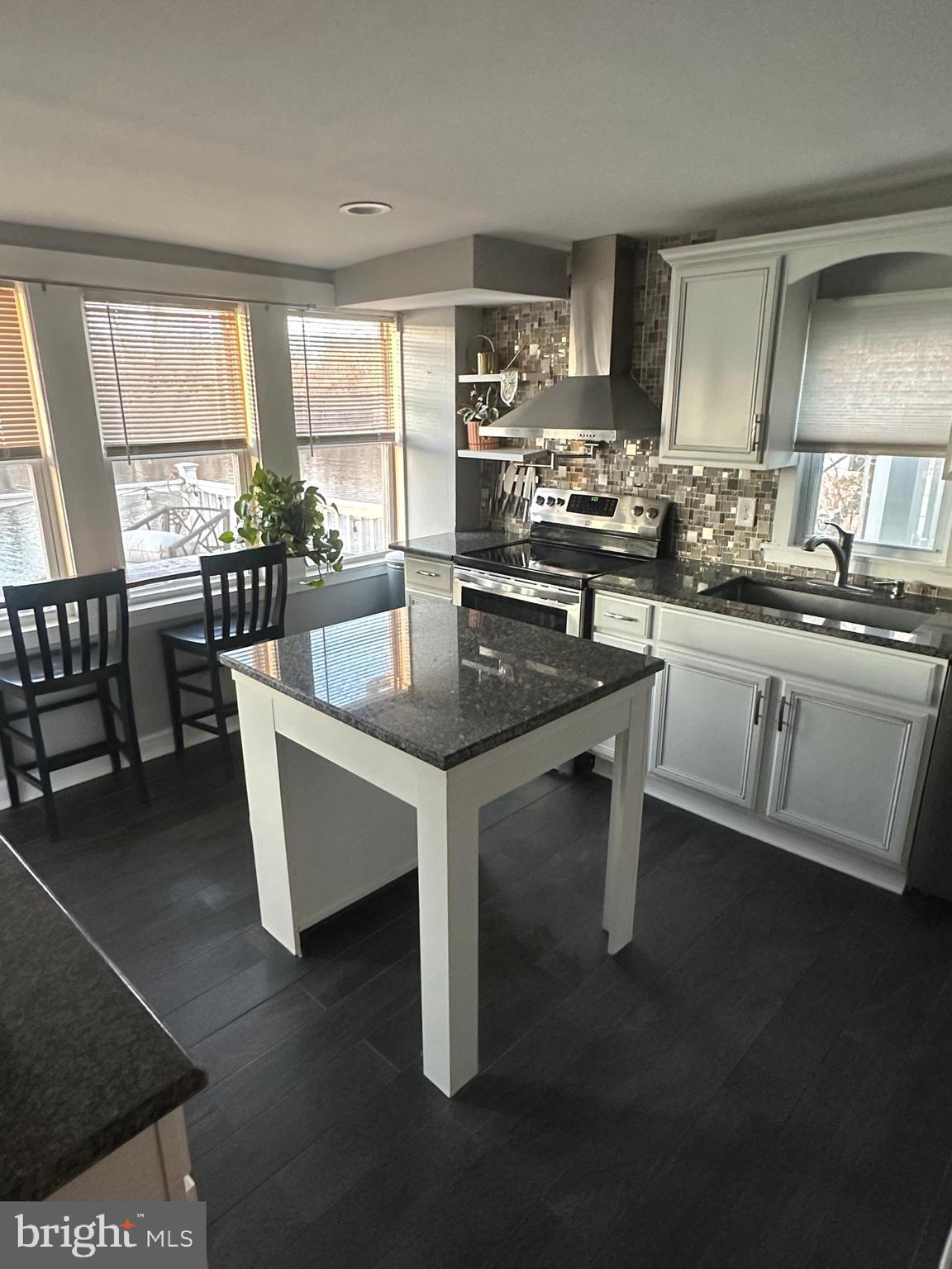 723 Newportville Road Croydon, PA 19021 - Photo 4 of 23 a kitchen with counter top space and dining table