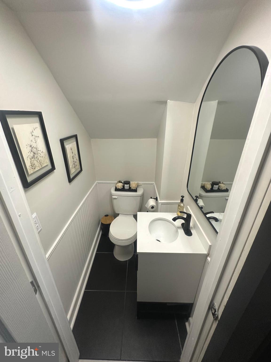 723 Newportville Road Croydon, PA 19021 - Photo 6 of 23 a bathroom with a sink a mirror and toilet