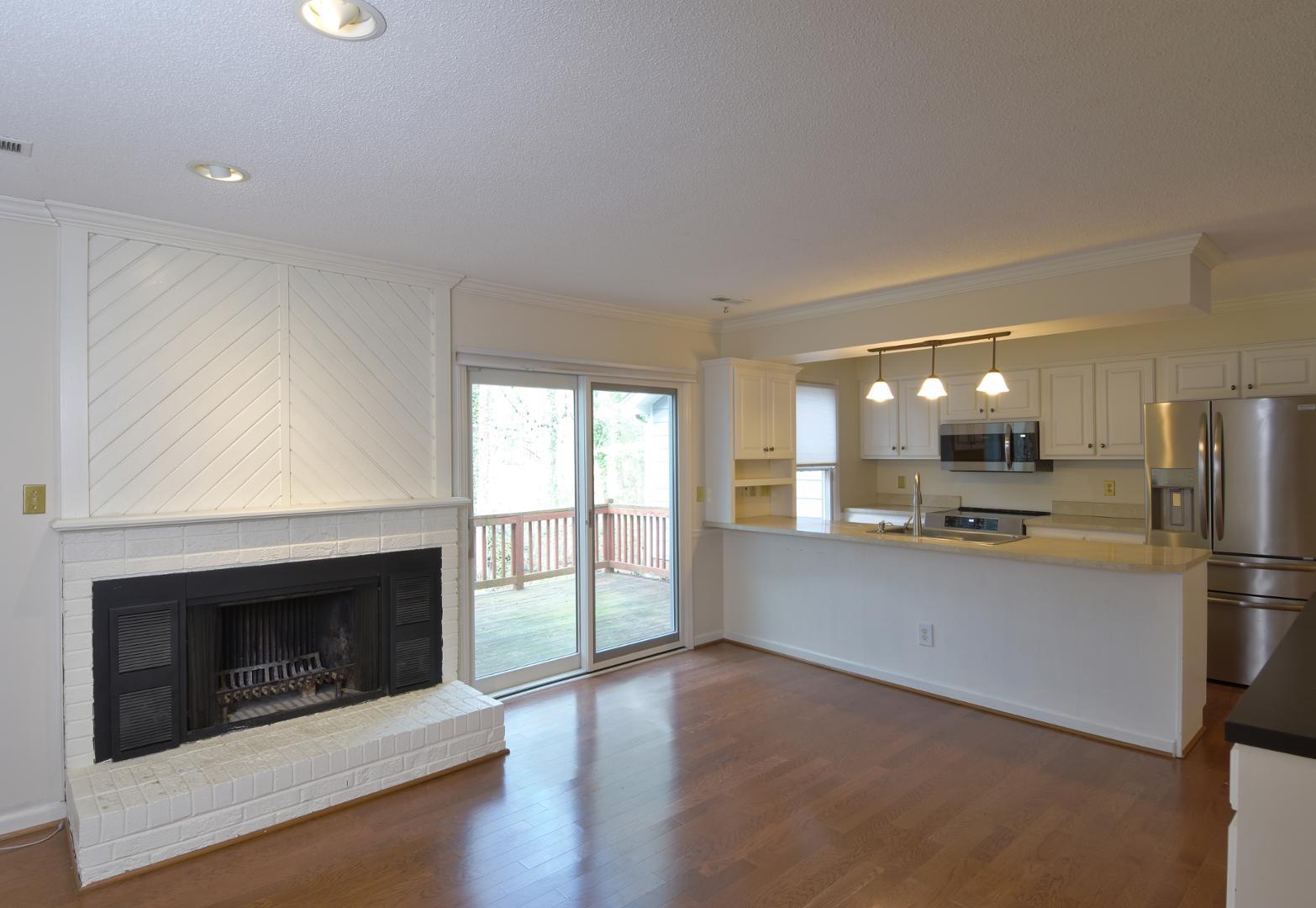 6403 Andsley Drive Raleigh, NC 27609 - Photo 3 of 18 a large kitchen with a stove and a refrigerator