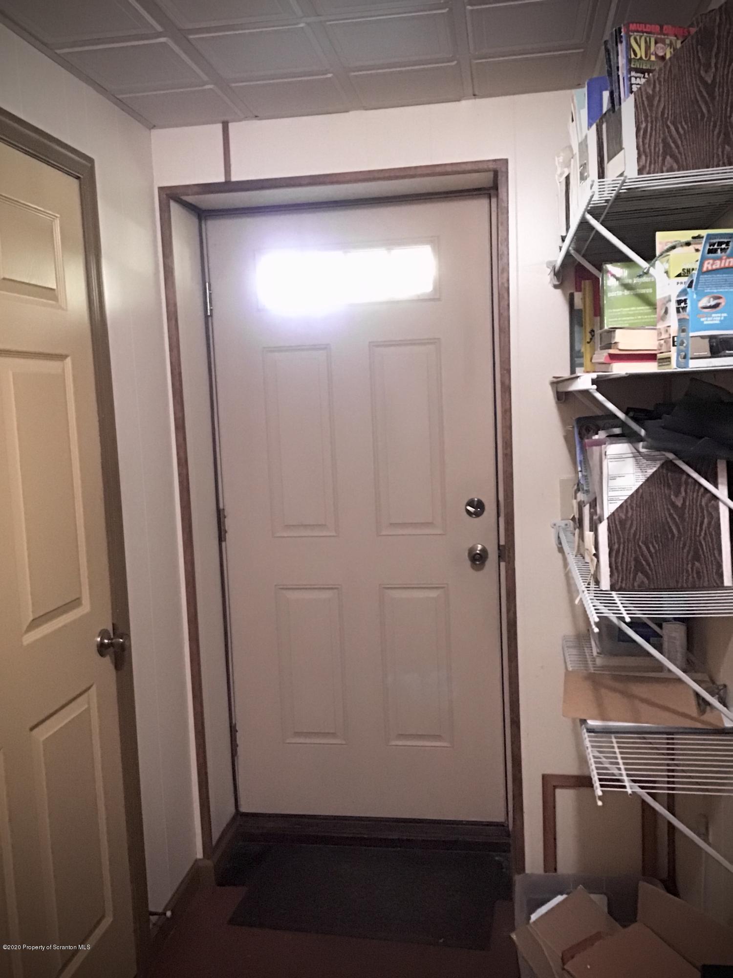 199 Eskra Road Lake Ariel, PA 18436 - Photo 20 of 36 a bathroom with a sink and mirror